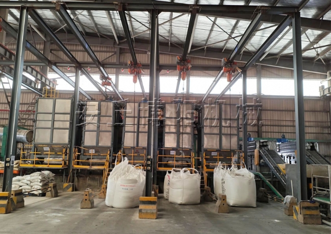 氧化鎂噸袋拆包機(jī)現(xiàn)場(chǎng)    噸袋破包機(jī)可多臺(tái)安裝